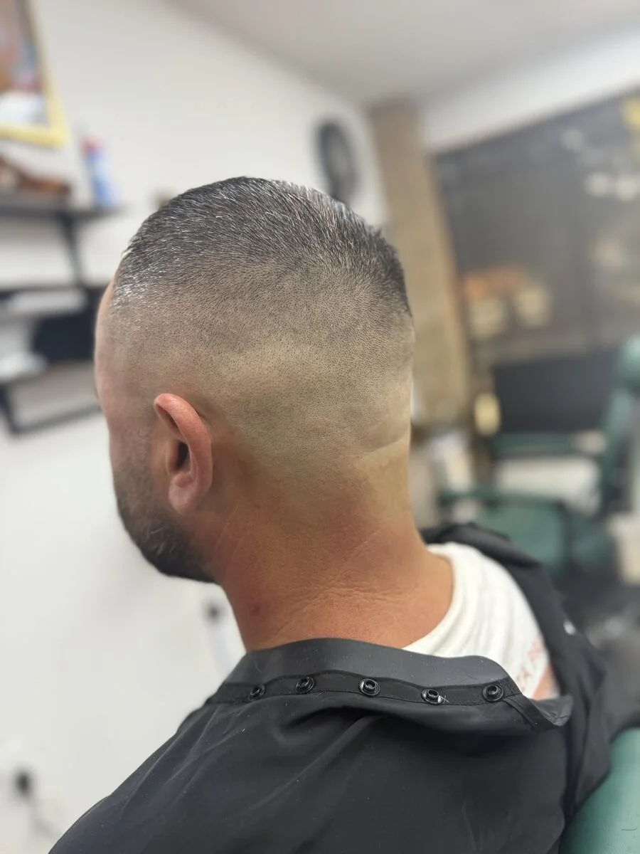 Skin fade back view — Blessed Barbershop Daphne AL